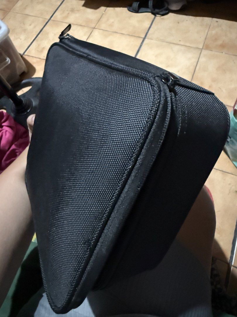 Black Makeup Organizer Bag with Compartments Preloved (Category: Makeup) located in Quezon City. Submitted by evsall14 (Listing ID 1454524225, Image 3). Description: - Stylish black makeup bag - Adjustable dividers for custom organization - Top lid with pockets and elastic straps for brushes - Secure zipper closure - Convenient side handle for easy carrying - Perfect for travel or daily use.