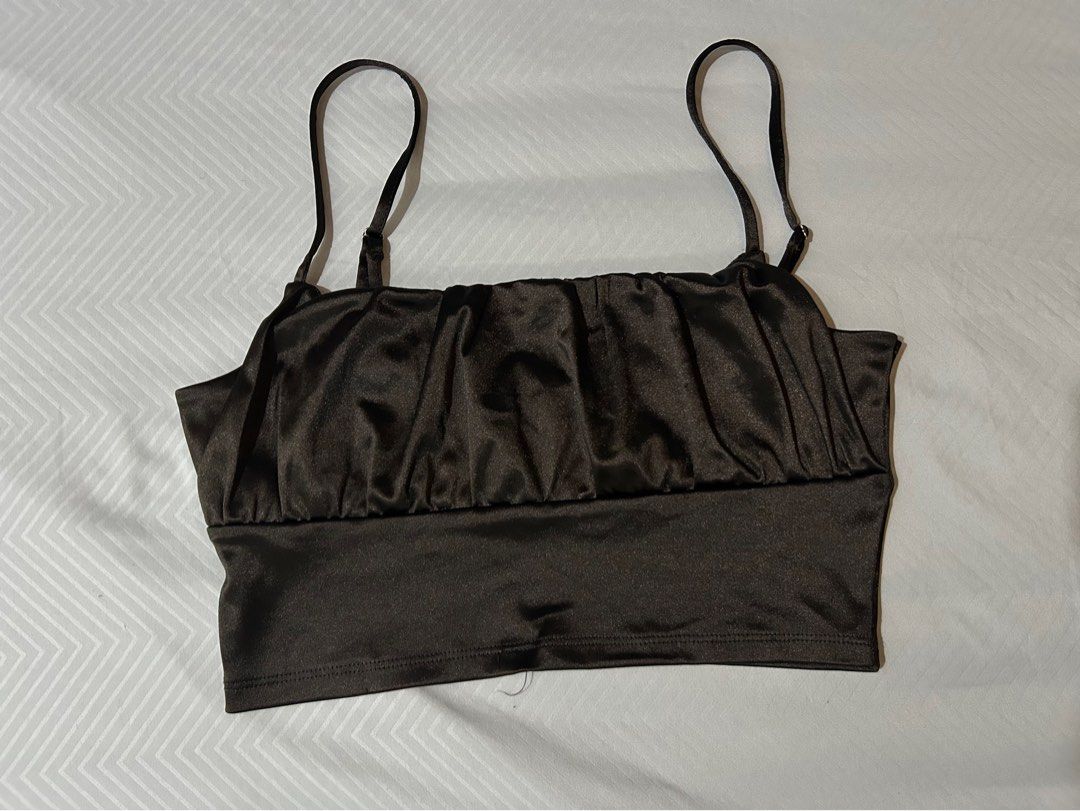 Black Ruched Camisole Crop Top (Category: Sleeveless) located in Manila. Submitted by fromrie (Listing ID 1454469287, Image 1). Description: - Stylish black camisole crop top - Features flattering ruched detailing at the front - Adjustable spaghetti straps for a perfect fit - Made from a shiny, eye-catching material - Tag indicates size S (please check measurements if available) fits med- semi large.
