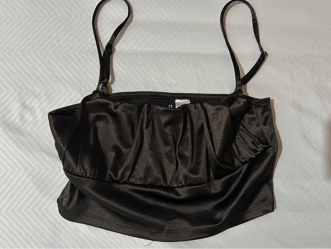 Black Ruched Camisole Crop Top (Category: Sleeveless) located in Manila. Submitted by fromrie (Listing ID 1454469287, Image 2). Description: - Stylish black camisole crop top - Features flattering ruched detailing at the front - Adjustable spaghetti straps for a perfect fit - Made from a shiny, eye-catching material - Tag indicates size S (please check measurements if available) fits med- semi large.