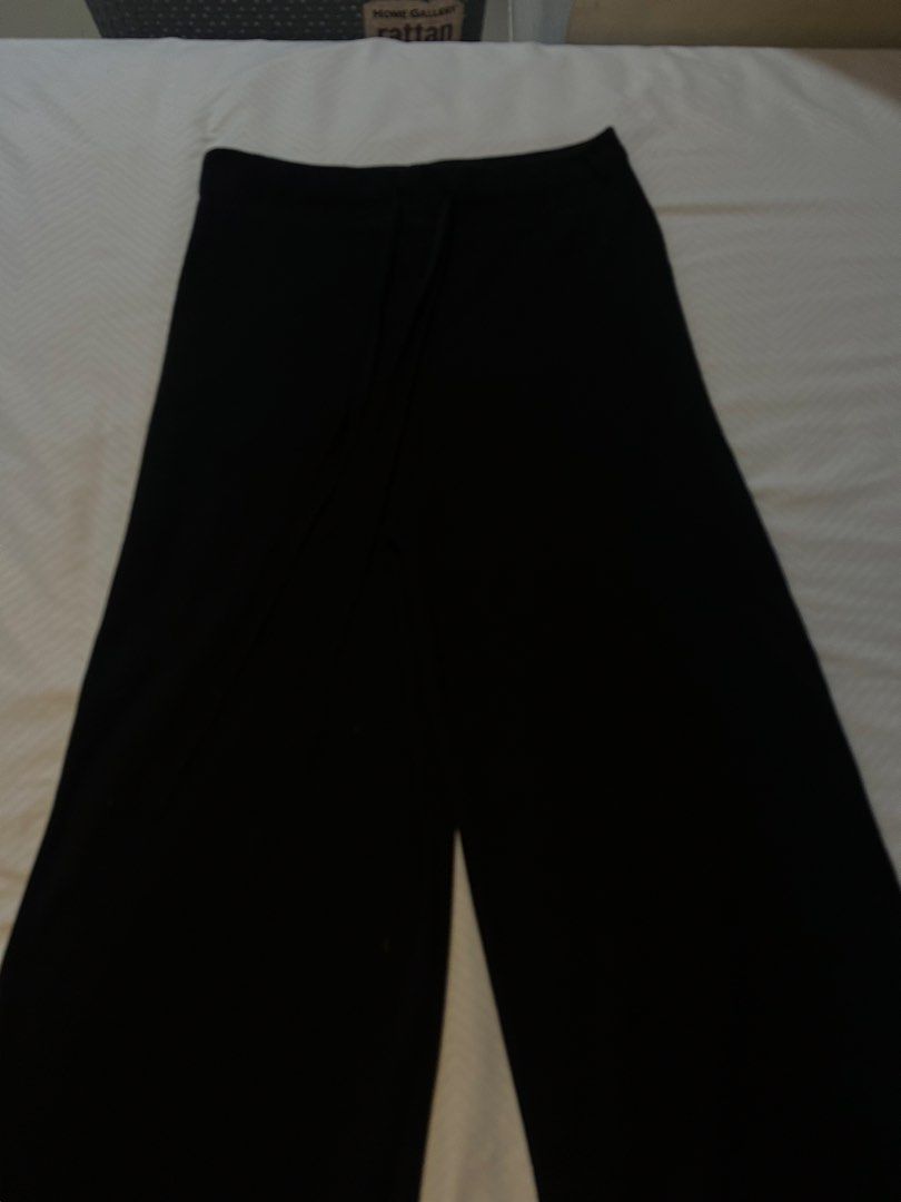 Black Wide Leg Pants (Category: Other Bottoms) located in Manila. Submitted by fromrie (Listing ID 1454504567, Image 2). Description: - Black wide leg pants - Comfortable and flowy fabric - Elastic waistband with adjustable drawstring - Trendy raw hem detail - Perfect for casual outings or dressing up worn once cut it too short 😅.