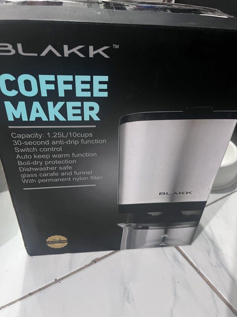 BLAKK Coffee Maker 1.25L/10cups with Permanent Filter (Category: Coffee Machines & Makers) located in Quezon City. Submitted by ajjjjj1 (Listing ID 1454455215, Image 1). Description: - Brews up to 10 cups (1.25L capacity) - 30-second anti-drip function - Auto keep warm feature - Boil-dry protection for safety - Dishwasher safe glass carafe and funnel - Comes with a permanent nylon filter.
