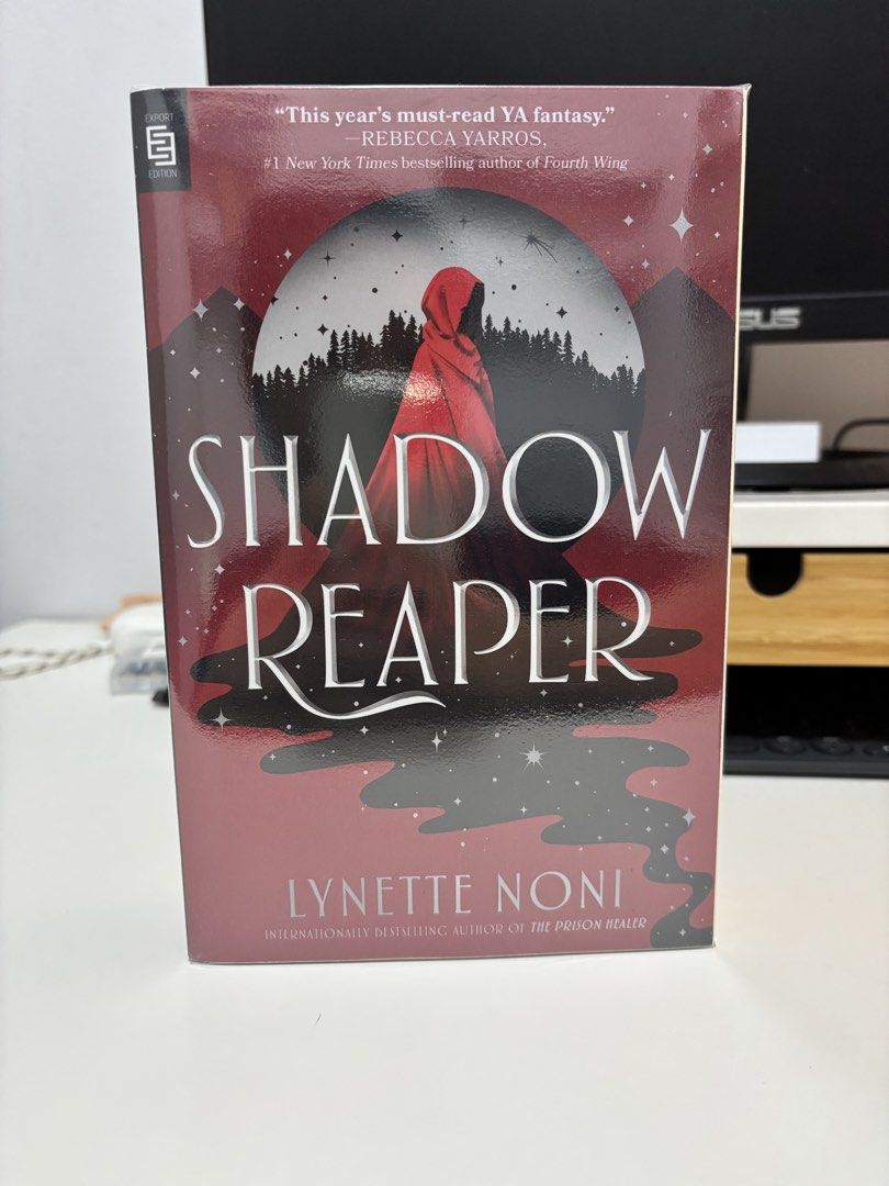 Booktok Shadow Reaper by Lynette Noni (Category: Storybooks) located in Batangas. Submitted by julthings (Listing ID 1454517827, Image 1). Description: No lowballers. ⭐️ Shadow Reaper, by Lynette Noni (UK Paperback) ⭐️ Like new (bought last July 2026) ⭐️ In super great condition. No foxing, no spine cracks, no annotations of any kind. ⭐️ Wrapped with no-residue plastic cover since day one. MOP: Payment first via e-wallet/bank transfer to GoTyme o
