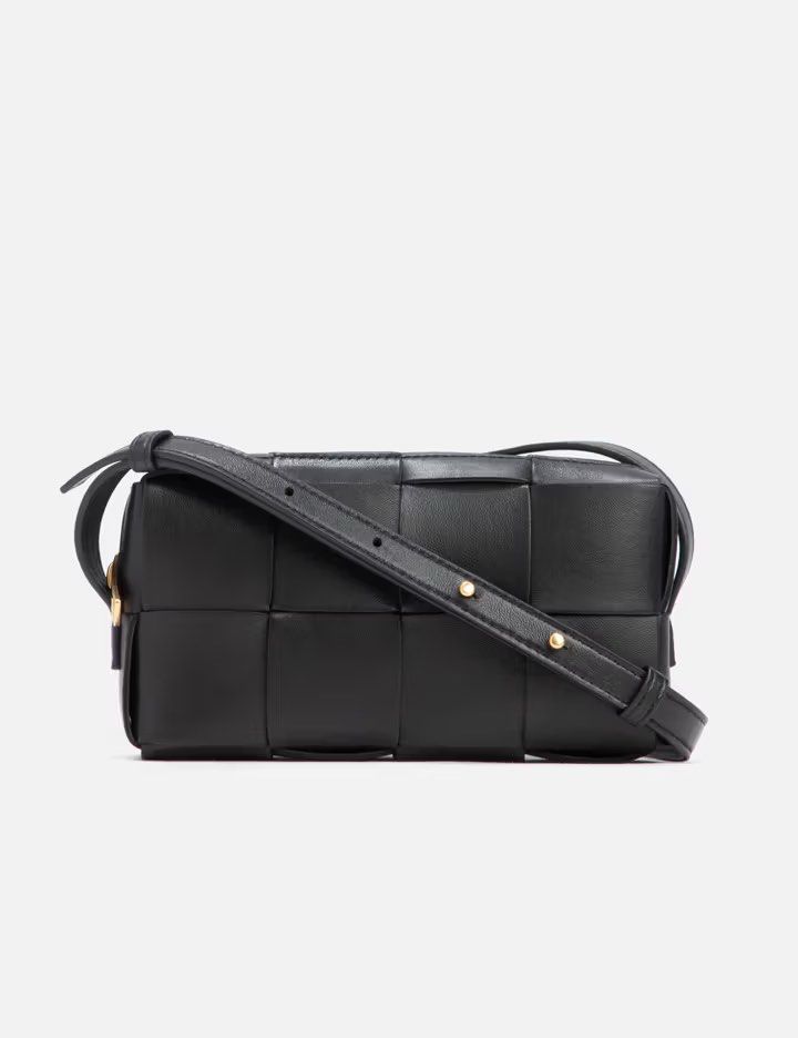 Bottega Veneta Cassette Camera Bag Black Leather (Category: Luxury Bags & Wallets) located in Manila. Submitted by madc_md (Listing ID 1454525322, Image 2). Description: - Authentic Bottega Veneta camera bag - Classic black Intrecciato leather - Includes original dust bag and authenticity card - Secure zipper closure - Adjustable strap for comfortable wear - Ideal for everyday use.
