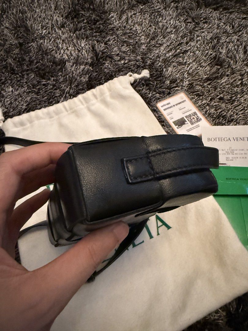 Bottega Veneta Cassette Camera Bag Black Leather (Category: Luxury Bags & Wallets) located in Manila. Submitted by madc_md (Listing ID 1454525322, Image 3). Description: - Authentic Bottega Veneta camera bag - Classic black Intrecciato leather - Includes original dust bag and authenticity card - Secure zipper closure - Adjustable strap for comfortable wear - Ideal for everyday use.