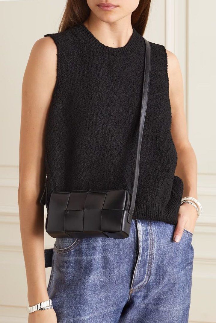 Bottega Veneta Cassette Camera Bag Black Leather (Category: Luxury Bags & Wallets) located in Manila. Submitted by madc_md (Listing ID 1454525322, Image 1). Description: - Authentic Bottega Veneta camera bag - Classic black Intrecciato leather - Includes original dust bag and authenticity card - Secure zipper closure - Adjustable strap for comfortable wear - Ideal for everyday use.