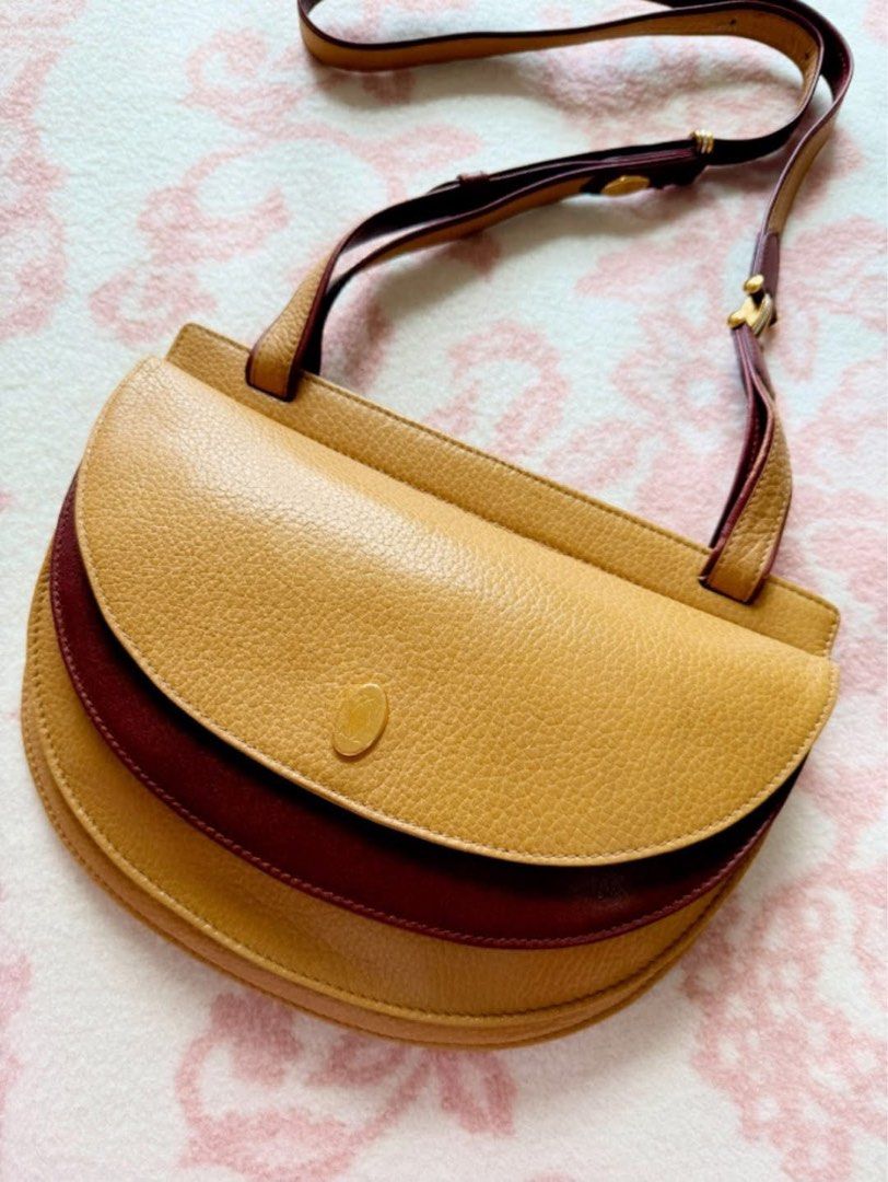 Cartier Bag (Category: Luxury Bags & Wallets) located in Quezon City. Submitted by liezl.marie (Listing ID 1454479610, Image 3). Description: Authentic vintage Must de C@rt!a€r Trinity Half-Moon leather shoulder bag. 14,800 Open for layaway. Disclaimer: We are not affiliated, associated, authorized, endorsed by or in any way officially connected with any other company or luxury brand. All copyrights are reserved to the original brand..