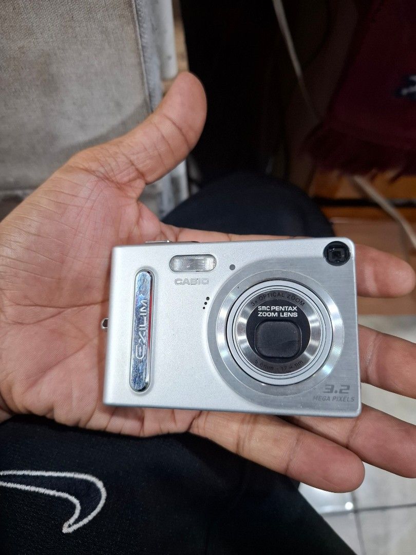 CASIO EX-Z3 B EXILIM 3.2 Megapixel Digital Camera (Category: Cameras) located in Santa Rosa. Submitted by echojapansurplus_01 (Listing ID 1454445888, Image 3). Description: - Silver Casio EXILIM digital camera - 3.2 Megapixel resolution - Pentax zoom lens - Records video and plays back photos - Compact and easy to carry - Great for casual snapshots - Minor scuffs on the body This item is japan surplus. selling as is. untested without charger. vis
