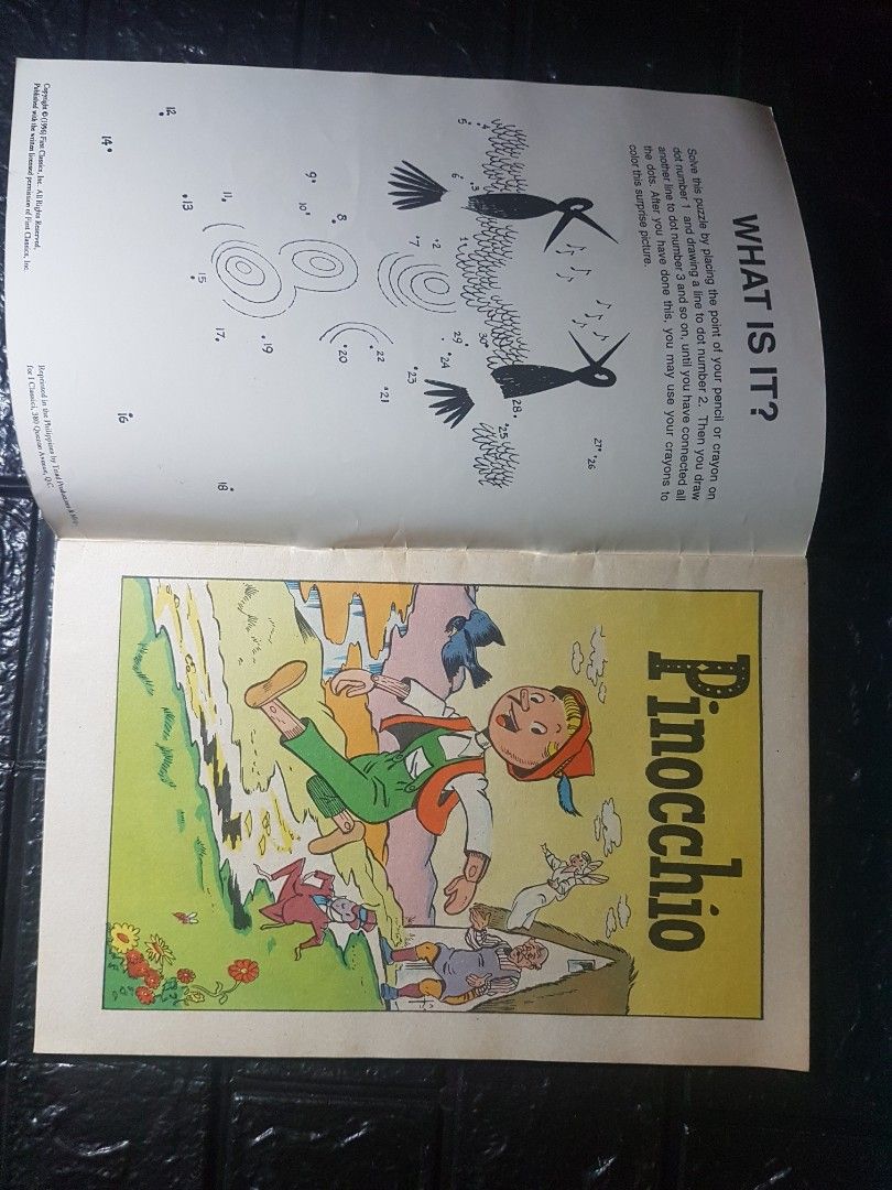 Classics Illustrated Junior Pinocchio Comics (Category: Children's Books) located in Quezon City. Submitted by strange.attic2 (Listing ID 1454374254, Image 2). Description: - Classic illustrated junior comic book featuring Pinocchio. - Issue number 513. - Includes the story of Pinocchio. - Features a fun connect-the-dots puzzle. - Ideal for young readers and vintage comic collectors. - Enjoy classic illustrations and a fun read..