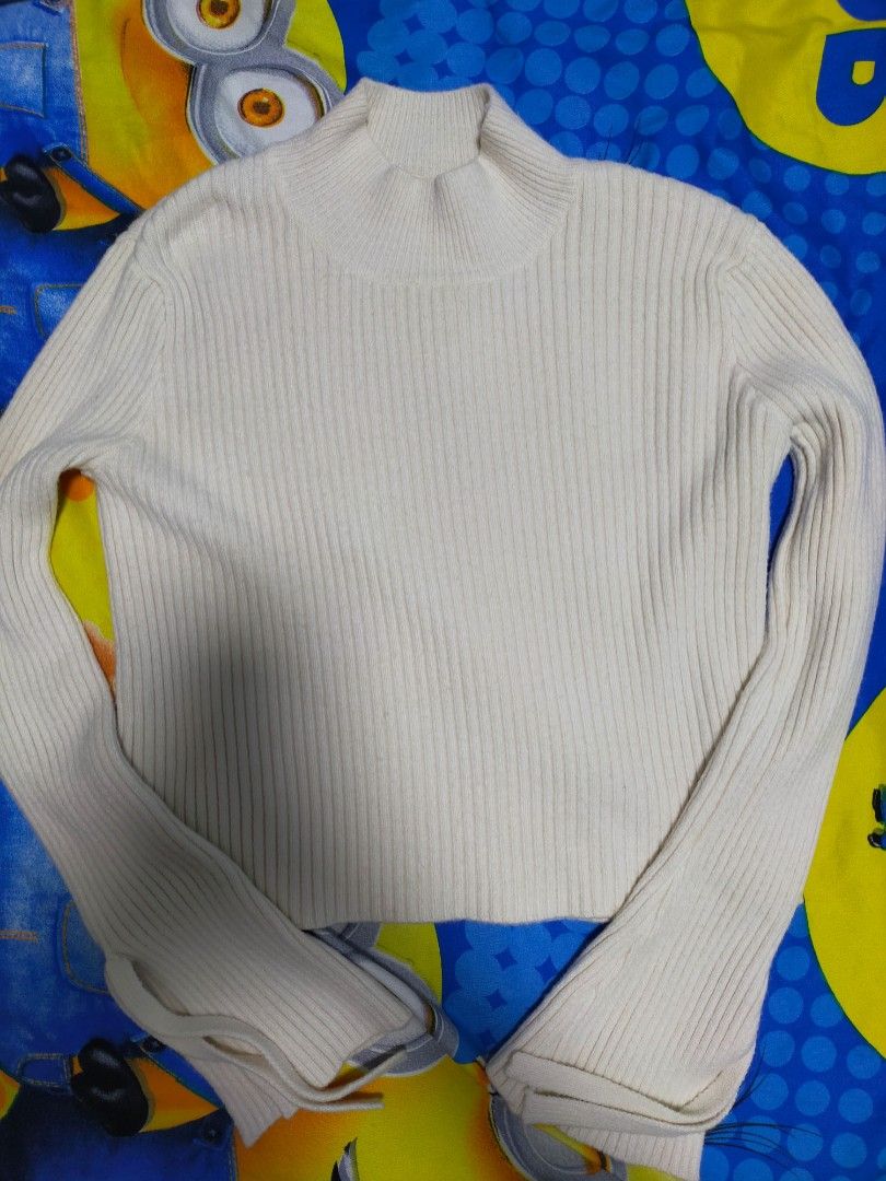 Cream Ribbed Mock Neck Sweater (Category: Coats, Jackets and Outerwear) located in Manila. Submitted by reecarts (Listing ID 1454547960, Image 1). Description: ₱ 250 + sf size small - med (best fit med), thick fabric never worn, no flaws .