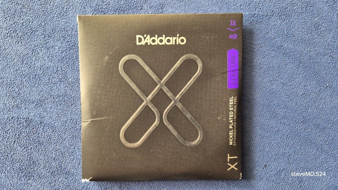 D'Addario XT Electric Guitar Strings - Medium Gauge (Category: Musical Instruments) located in Bantay. Submitted by backyardcyclist (Listing ID 1454489041, Image 3). Description: - D'Addario XT electric guitar strings - Medium gauge (11, 14, 18, 28, 38, 49) - Nickel-plated steel construction - Extended string life for less frequent changes - Natural feel, just like uncoated strings - Perfect for any electric guitar.