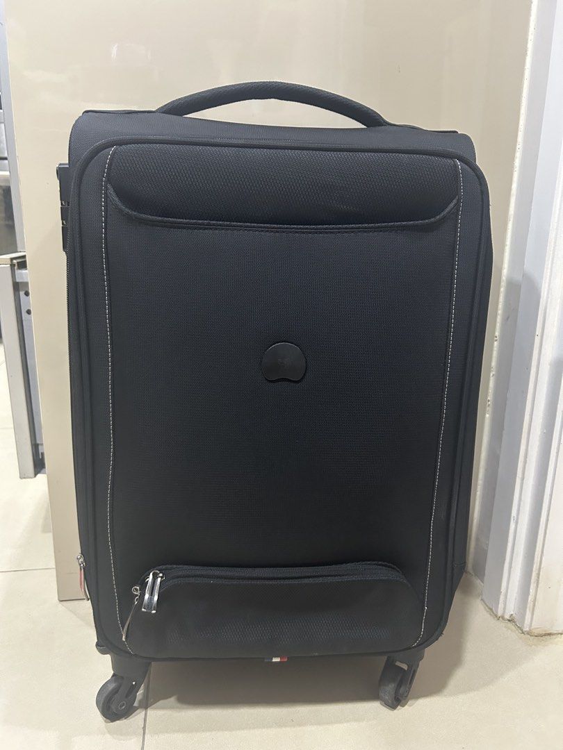 Delsey Black Softside Spinner Luggage (Category: Luggage) located in Cebu City. Submitted by hazel19472812 (Listing ID 1454477464, Image 1). Description: - Black Delsey softside spinner luggage - Integrated TSA combination lock for security - Interior straps to keep your belongings in place - Convenient front pocket for quick access - Smooth-rolling spinner wheels for easy maneuverability - Ideal for all your travel needs.