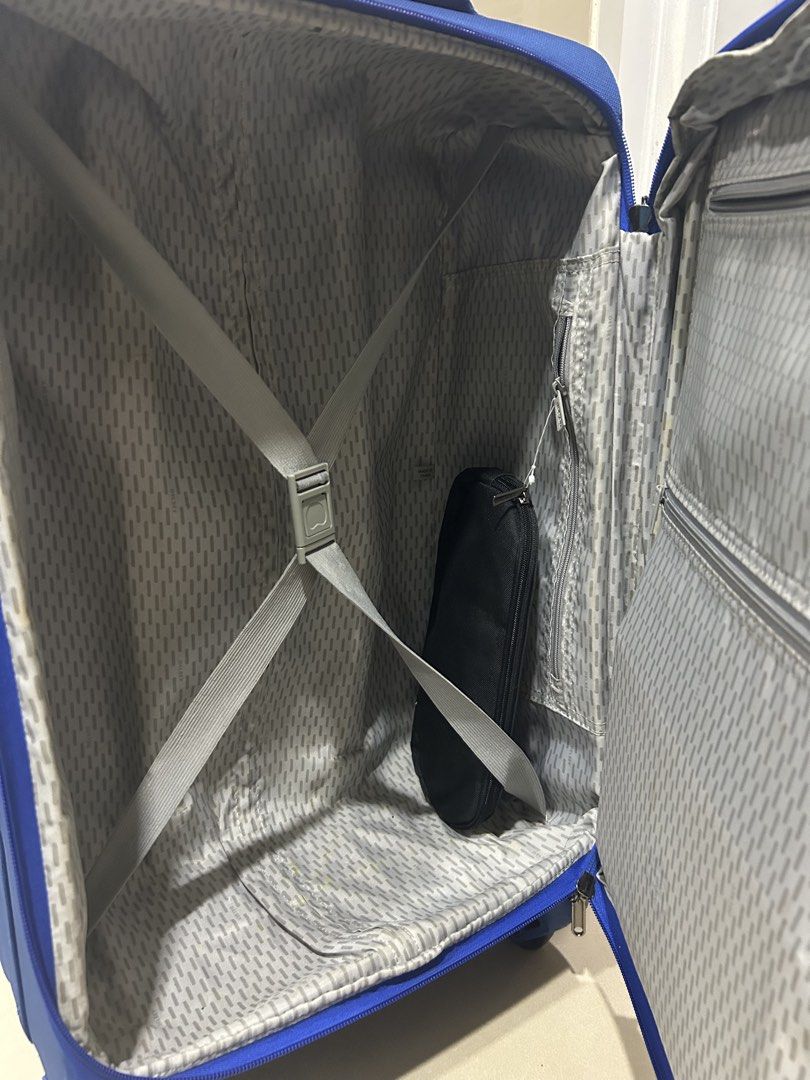 Delsey Blue Softside Spinner Luggage (Category: Luggage) located in Cebu City. Submitted by hazel19472812 (Listing ID 1454477518, Image 3). Description: - Blue Delsey suitcase - Built-in TSA lock on the side - Interior straps and zippered pockets for organization - Comes with a small black pouch - Wheels are intact and functional - Perfect for your next adventure!.