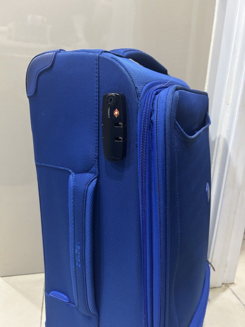 Delsey Blue Softside Spinner Luggage (Category: Luggage) located in Cebu City. Submitted by hazel19472812 (Listing ID 1454477518, Image 2). Description: - Blue Delsey suitcase - Built-in TSA lock on the side - Interior straps and zippered pockets for organization - Comes with a small black pouch - Wheels are intact and functional - Perfect for your next adventure!.