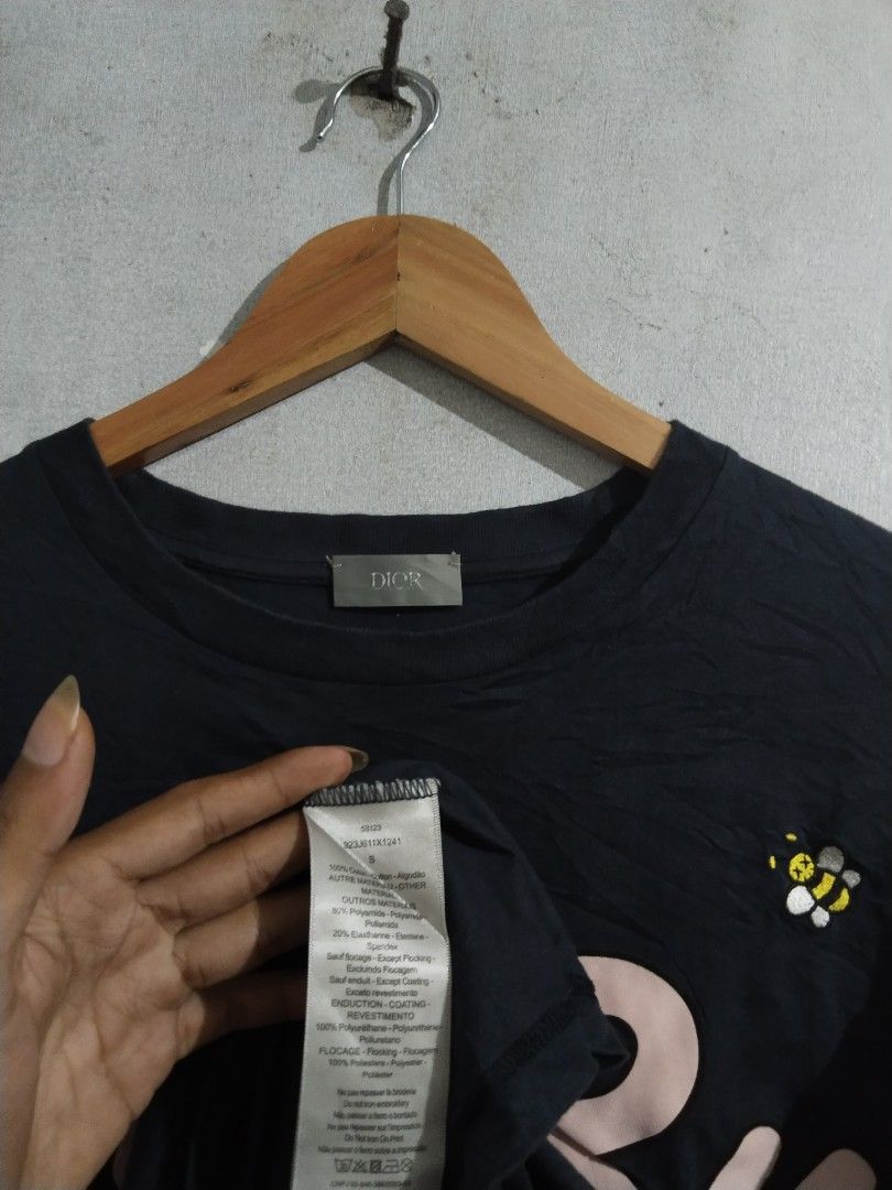 Dior Bee Logo T-Shirt (Category: Tshirts & Polo Shirts ) located in Tabaco. Submitted by strain_finds (Listing ID 1454410792, Image 3). Description: - Authentic Black Dior T-Shirt - Features iconic bee graphic - Playful Dior logo detail - Made from soft cotton - Ideal for casual wear - Please check photos for condition and details.
