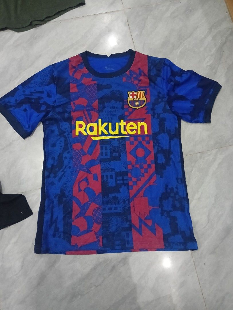 FC Barcelona 2020-21 Messi Jersey (Category: Activewear) located in Odiongan. Submitted by thrifthub_bundang07 (Listing ID 1454554602, Image 2). Description: FC Barcelona Jersey - Features Lionel Messi's iconic #10 - Rakuten sponsor prominently displayed on the front - Classic blue and red striped design - UNICEF logo on the back - Made from durable polyester material - A must-have for any dedicated FC Barcelona fan!.