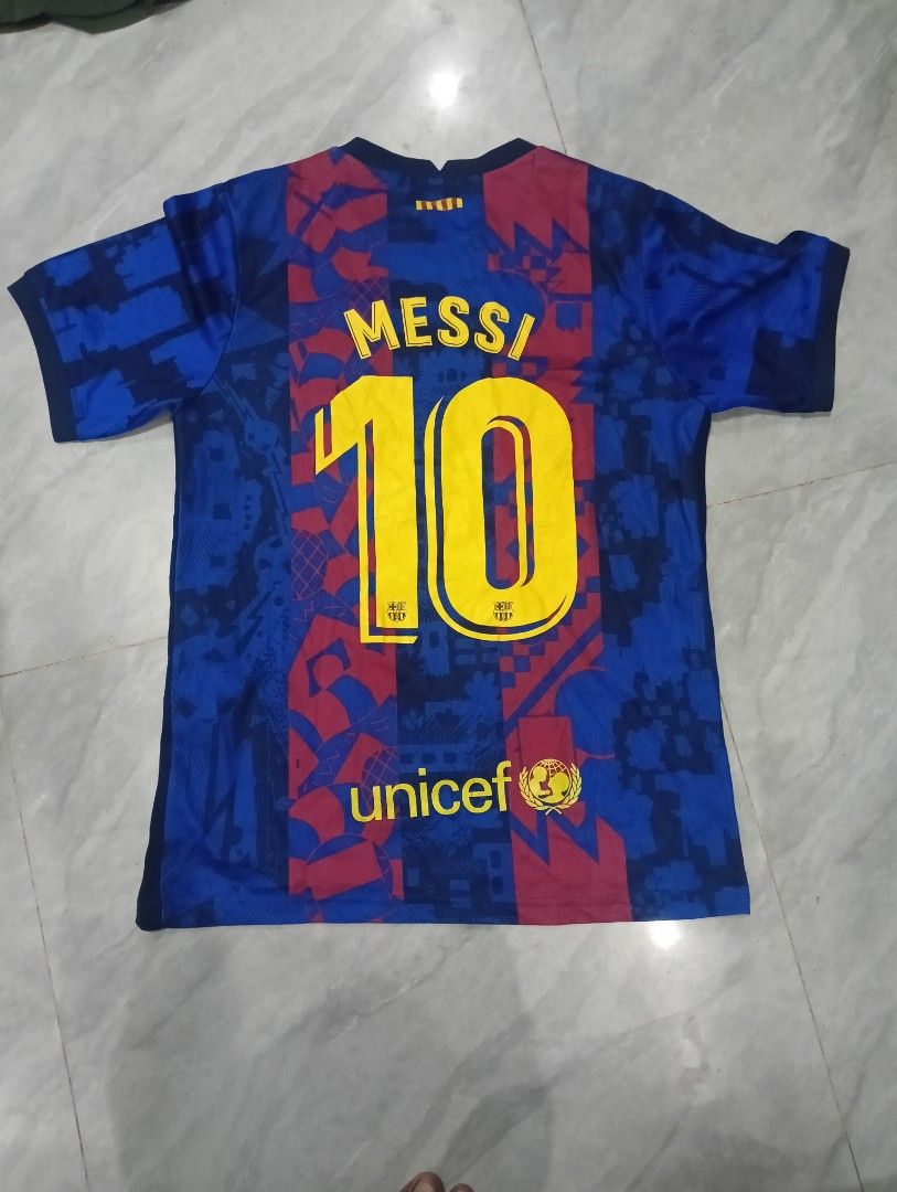 FC Barcelona 2020-21 Messi Jersey (Category: Activewear) located in Odiongan. Submitted by thrifthub_bundang07 (Listing ID 1454554602, Image 1). Description: FC Barcelona Jersey - Features Lionel Messi's iconic #10 - Rakuten sponsor prominently displayed on the front - Classic blue and red striped design - UNICEF logo on the back - Made from durable polyester material - A must-have for any dedicated FC Barcelona fan!.