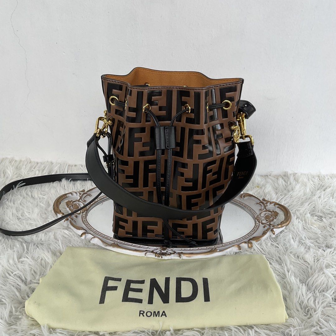 Fendi Monogram Bucket Bag Brown Black (Category: Luxury Bags & Wallets) located in San Fernando. Submitted by seokjinnie08 (Listing ID 1454381915, Image 2). Description: - Fendi bucket bag - Classic brown and black FF monogram pattern - Genuine leather trim - Secure drawstring closure - Elegant gold hardware - Comes with original dust bag - Ideal for everyday style and practicality Japan preloved.