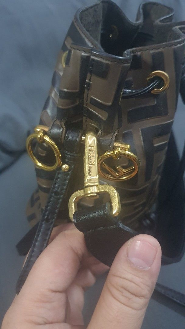 Fendi Zucca Monogram Bucket Bag (Category: Luxury Bags & Wallets) located in Manila. Submitted by togodbethegloryteamjesus (Listing ID 1454403858, Image 2). Description: - Fendi Bucket Bag - NGA please Self Authenticate - Iconic Zucca Monogram Pattern - Drawstring Closure with Leather Detailing - Gold Hardware Accents - Made in Italy and has code - Classic addition to any collection.