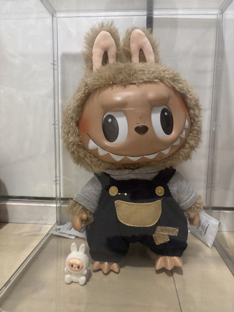 figures (Category: Toy Figures) located in Singapore. Submitted by melodylvrr (Listing ID 1454531465, Image 3). Description: - big labubu is $60 - secret labubu is $65 - Mickey mouse is $15 - yellow keychain is $15 - crybaby pouch is &20 - all the figures is $10.