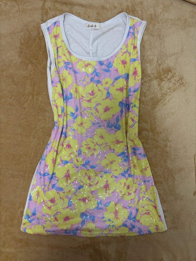 Floral Sequin Top (Category: Sleeveless) located in Manila. Submitted by lovedbynabix (Listing ID 1454413409, Image 1). Description: Cute floral sequin tank top. Yellow, pink, blue flowers on light background. Sleeveless. Perfect for casual wear with jeans or shorts..