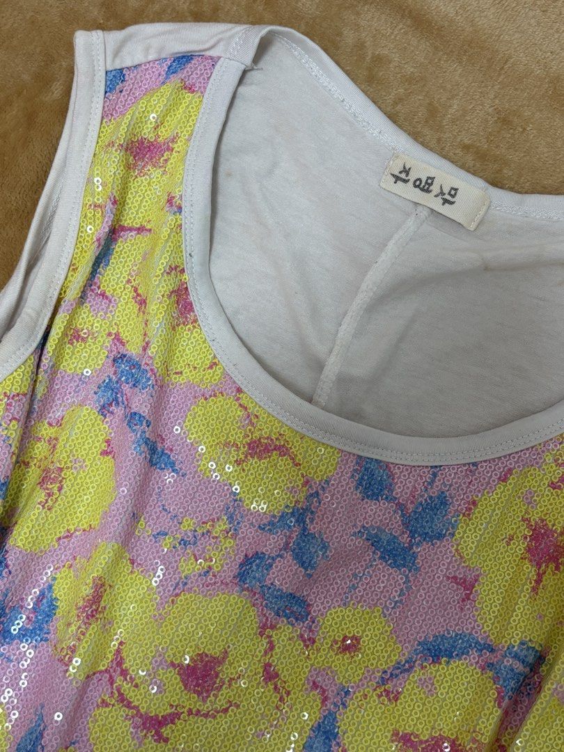 Floral Sequin Top (Category: Sleeveless) located in Manila. Submitted by lovedbynabix (Listing ID 1454413409, Image 2). Description: Cute floral sequin tank top. Yellow, pink, blue flowers on light background. Sleeveless. Perfect for casual wear with jeans or shorts..