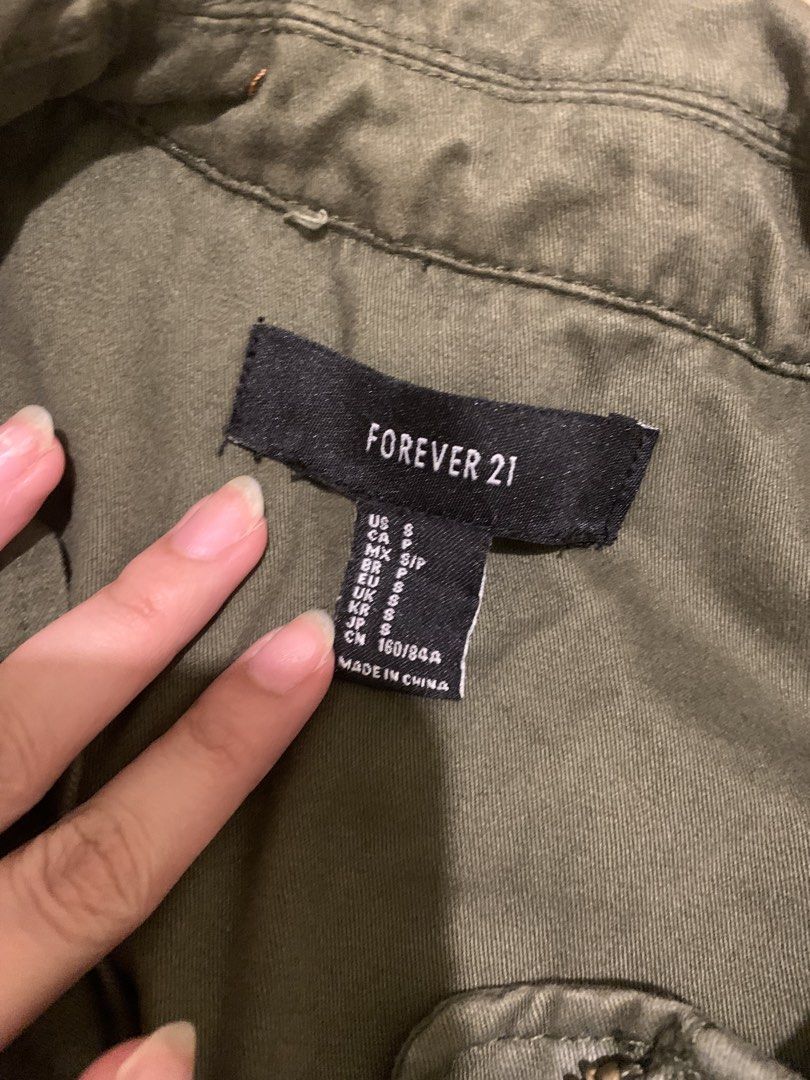 Forever 21 Army Jacket (Category: Coats, Jackets and Outerwear) located in Manila. Submitted by coquettecore (Listing ID 1454534045, Image 2). Description: Size: Medium Women Army Green Military Jacket Collar Type GCASH LALAMOVE .