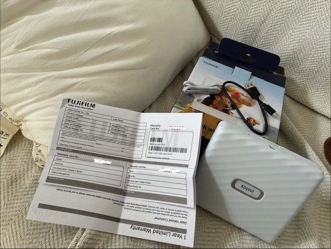Fujifilm Instax Link Wide Smartphone Printer (Category: Printers, Scanners & Copiers) located in Makati City. Submitted by momoco2056 (Listing ID 1454390571, Image 2). Description: - Fujifilm Instax Link Wide printer - Connects to your smartphone for instant photo prints - Includes USB cable - Comes with original box - Warranty card included - User-friendly operation.