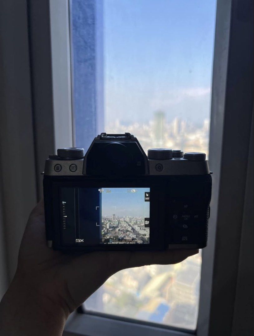 Fujifilm XT-100 (Category: Cameras) located in Manila. Submitted by itsmechel24 (Listing ID 1454534211, Image 3). Description: Fujifilm X-t100 No issue Minimal use Inclusions: -charger -battery -bag -strap -lens -lens cap -microphone .