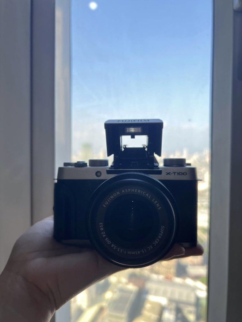 Fujifilm XT-100 (Category: Cameras) located in Manila. Submitted by itsmechel24 (Listing ID 1454534211, Image 2). Description: Fujifilm X-t100 No issue Minimal use Inclusions: -charger -battery -bag -strap -lens -lens cap -microphone .