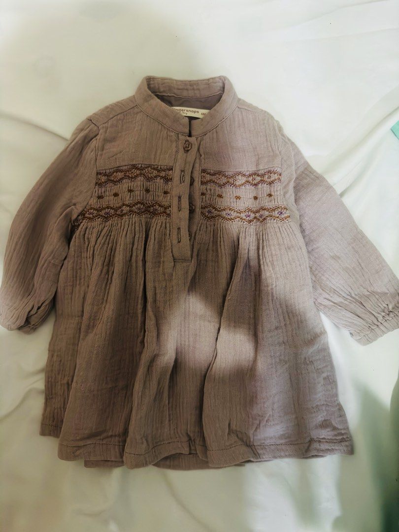 Gingersnaps Baby Dress 6M (Category: Babies & Kids Fashion) located in Manila. Submitted by officialmsp (Listing ID 1454482959, Image 2). Description: - Cute Gingersnaps dress - Size: 6 months - Lovely embroidered detail on the front - Soft, crinkled fabric - Button closure at the front - Long sleeves with elastic cuffs.