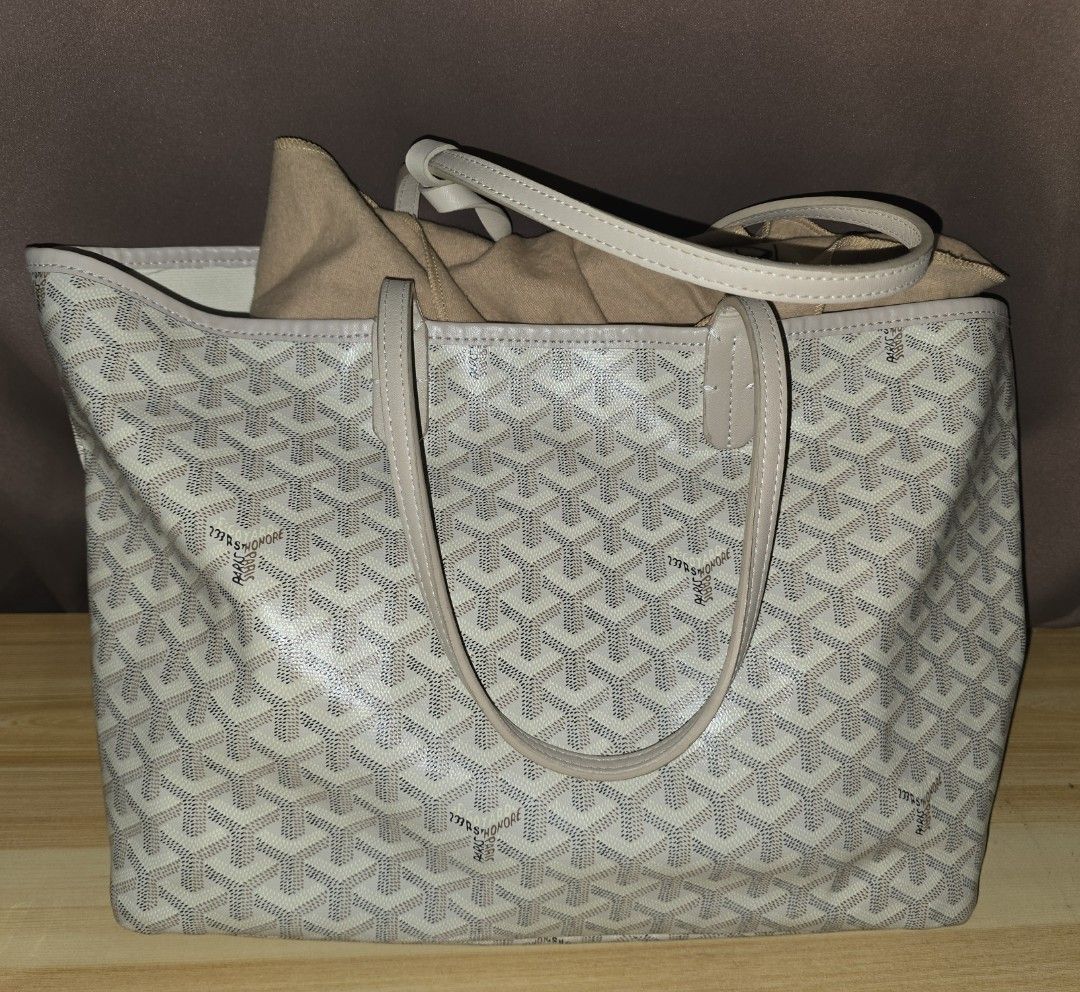 Goyard St. Louis Tote Bag (Category: Luxury Bags & Wallets) located in Quezon City. Submitted by shapaholiq_04 (Listing ID 1454397132, Image 1). Description: - Classic Goyard St. Louis tote - Beige and grey monogram pattern - Leather trim and handles - Spacious interior, ideal for everyday or travel - Comes with dust bag - A timeless and iconic piece not OG.