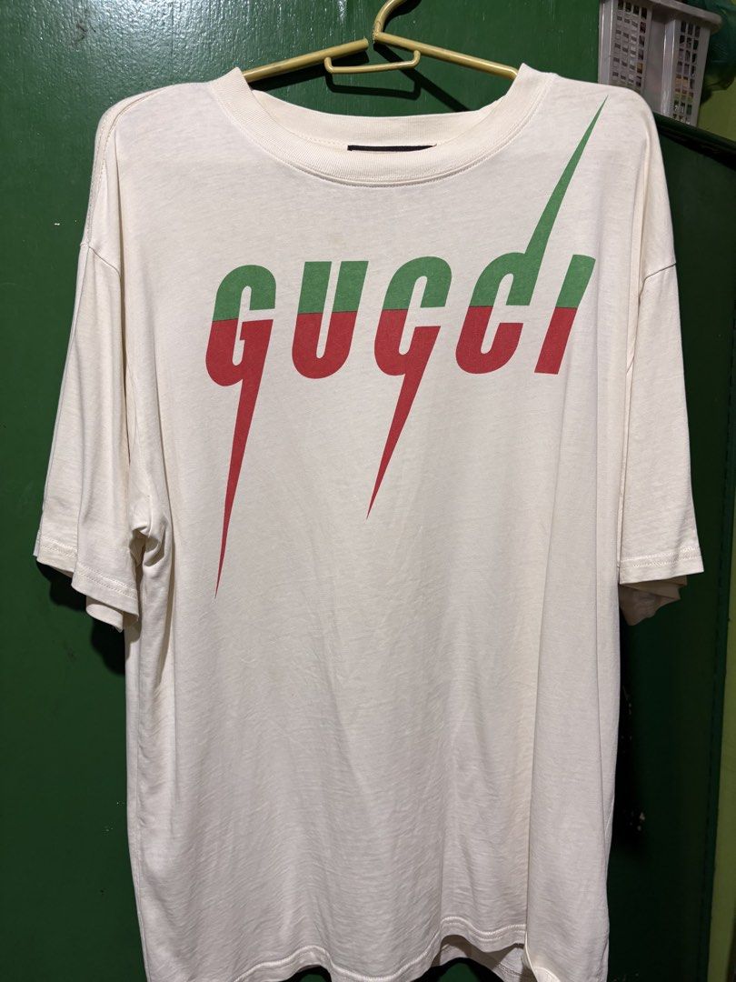 Gucci shirt (Category: Luxury Apparel) located in Manila. Submitted by jacebased (Listing ID 1454518287, Image 1). Description: 8/10 Signs of minimal stains and stretch neck line Large on size (to XXL oversized).