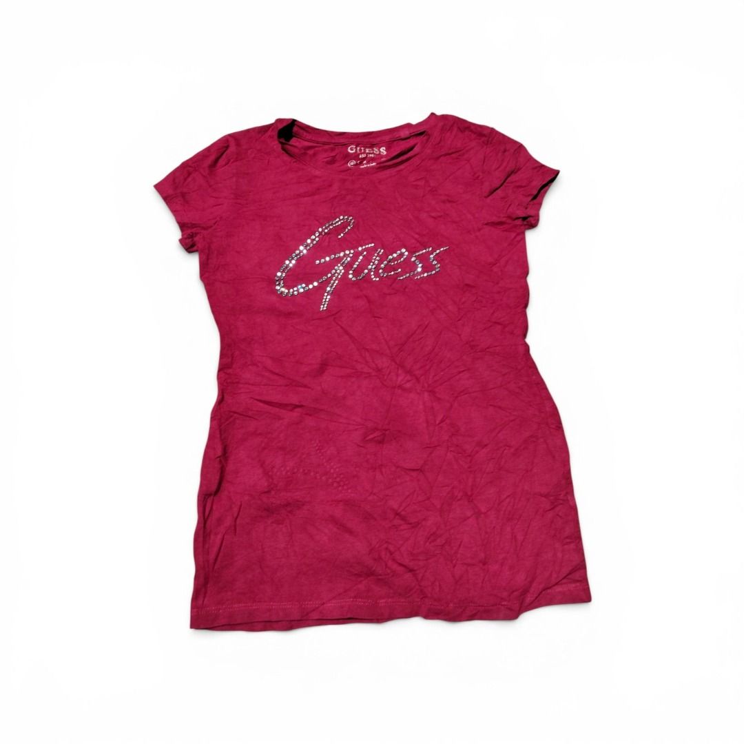 Guess Rhinestone Logo T-shirt (Category: Tshirts & Polo Shirts ) located in Caloocan City. Submitted by rodanthon (Listing ID 1454501464, Image 1). Description: Pink Guess tee with sparkly rhinestone logo. Short sleeves. Great for casual wear..