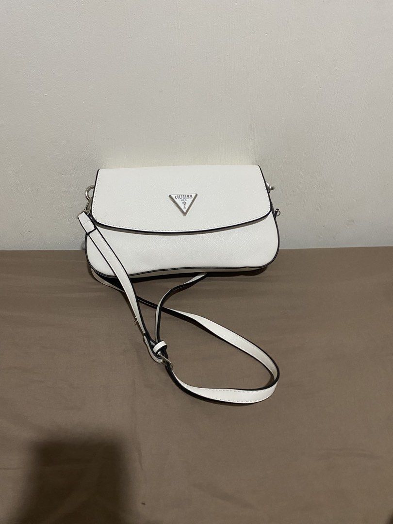 Guess shoulder bag in white (Category: Shoulder Bags) located in Cotabato. Submitted by inombeer (Listing ID 1453019617, Image 2). Description: 💕Good as new 💕 Used for 2 times (i like black more) 💕 Bought in KCC Guess physical store 💕Comes with long and short strap 💕 Bought for 5300 at Guess KCC 💕 RUSH SALE. NEED FUNDS.