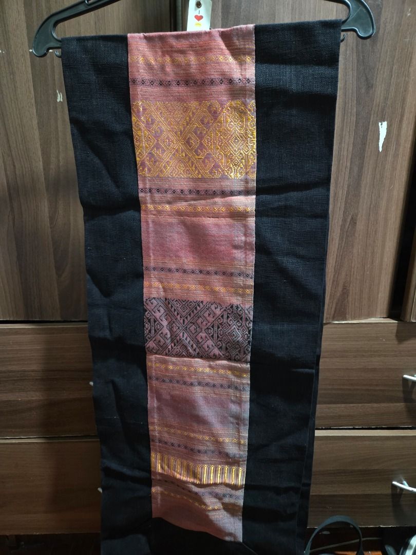 Handwoven Table Runner with Black Borders (Category: Table Linen & Textiles) located in Quezon City. Submitted by lafontanabuonafortuna (Listing ID 1454520716, Image 1). Description: - Beautiful handwoven table runner - Features intricate green and gold patterns - Solid black borders for a striking contrast - Adds a unique touch to any table setting - Ideal for home decor or as a thoughtful gift Take all 3 for 3000 php .