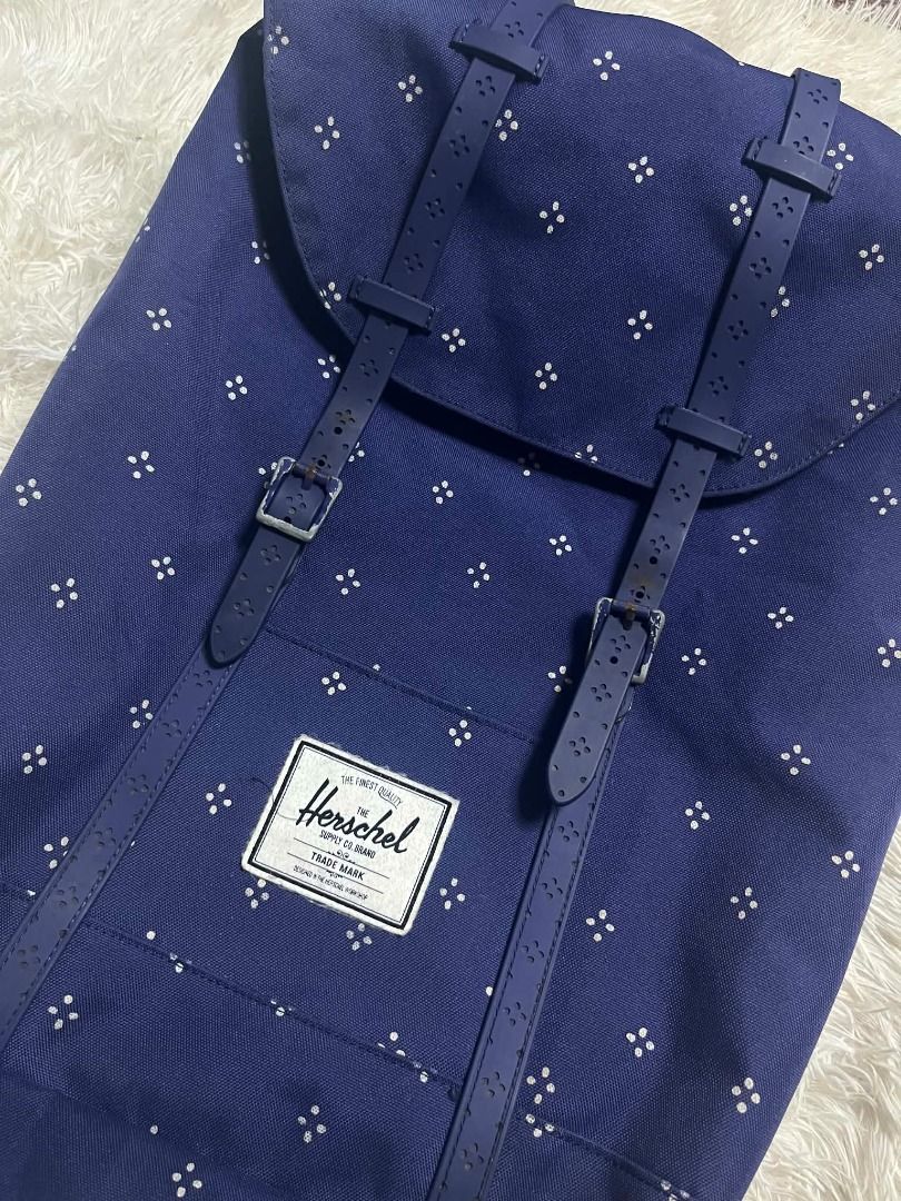 Herschel Supply Co. Blue Ditsy Floral Backpack (Category: Backpacks) located in Manila. Submitted by senggggg. (Listing ID 1454517935, Image 2). Description: Excellent condition no hidden issue issue is metal minimal rust .