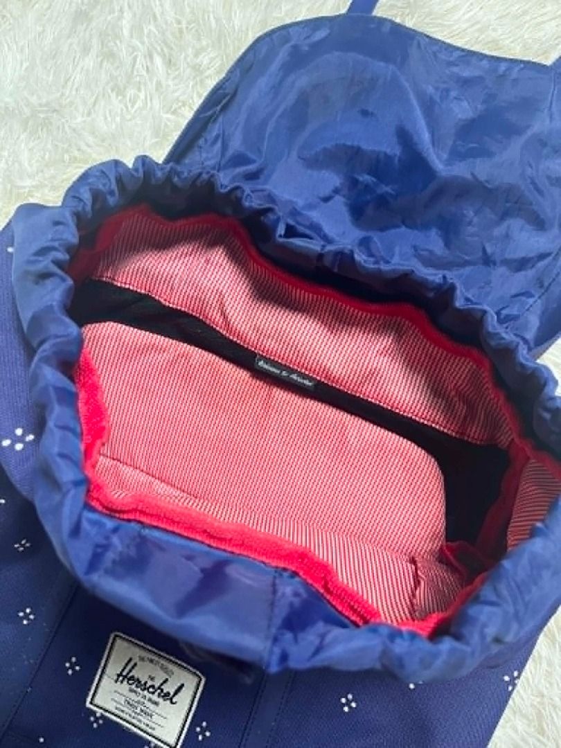 Herschel Supply Co. Blue Ditsy Floral Backpack (Category: Backpacks) located in Manila. Submitted by senggggg. (Listing ID 1454517935, Image 3). Description: Excellent condition no hidden issue issue is metal minimal rust .
