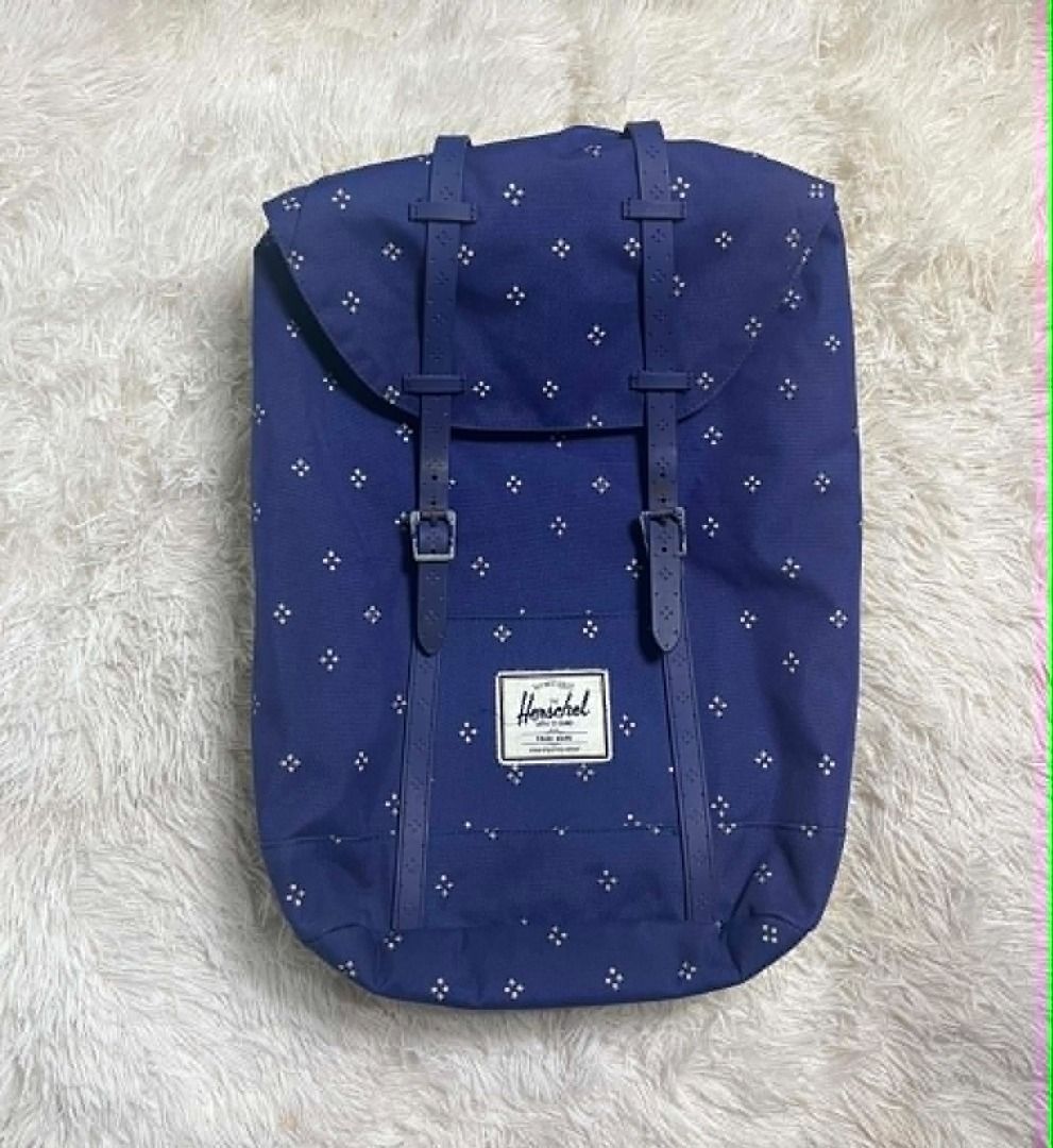 Herschel Supply Co. Blue Ditsy Floral Backpack (Category: Backpacks) located in Manila. Submitted by senggggg. (Listing ID 1454517935, Image 1). Description: Excellent condition no hidden issue issue is metal minimal rust .