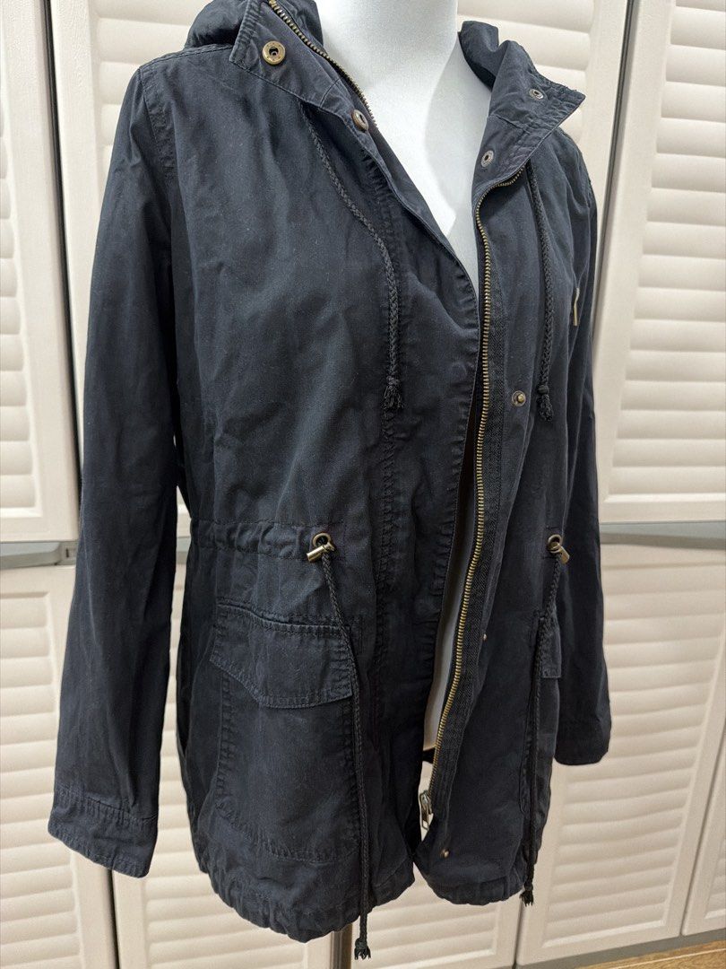 H&M Black Oversized Long Hooded Utility Jacket with Drawstring Waist (Category: Coats, Jackets and Outerwear) located in Quezon City. Submitted by shoppingcartmnl (Listing ID 1454371328, Image 2). Description: - Classic black hooded jacket - Zip-up front with button closures - Adjustable drawstrings at waist and hem - Multiple front pockets - Ideal for casual layering and easy styling - check stain.