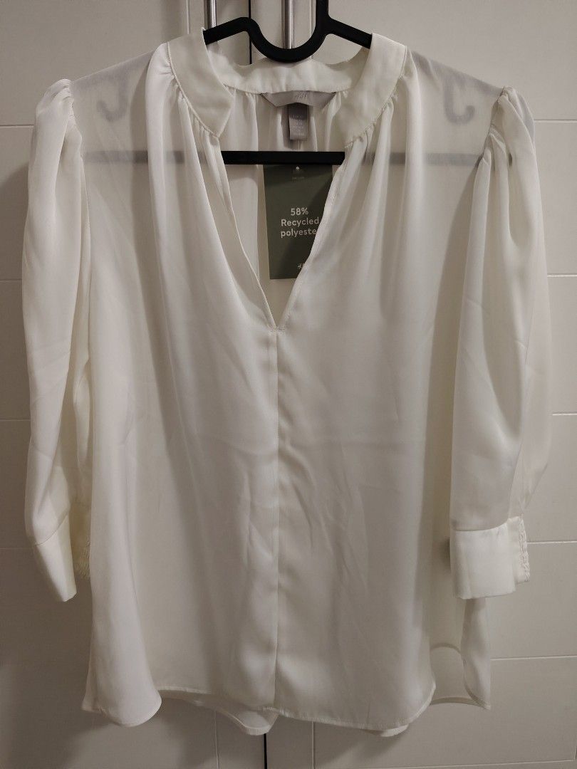 H&M blouse (Category: Blouses) located in Mandaluyong City. Submitted by pinkcel (Listing ID 1454461307, Image 2). Description: Brand new and unused condition Sf shouldered by the buyer.