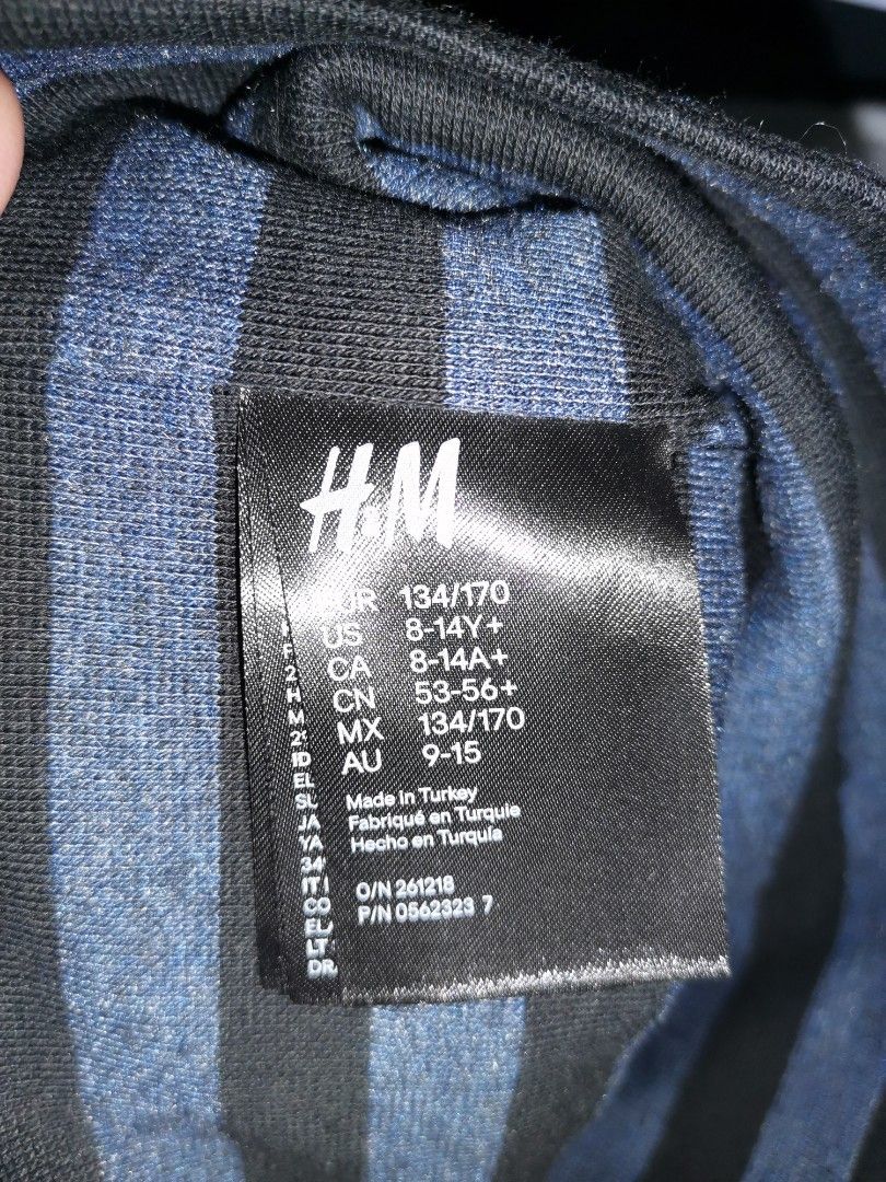 H&M Striped Beanie Hat (Category: Babies & Kids Fashion) located in Quezon City. Submitted by heybailey (Listing ID 1454422522, Image 3). Description: - Brand: H&M - Color: Blue and Black Stripes - Size: 134/170 (fits 8-14 years) - Origin: Made in Turkey - Features: Great for keeping warm, simple design.