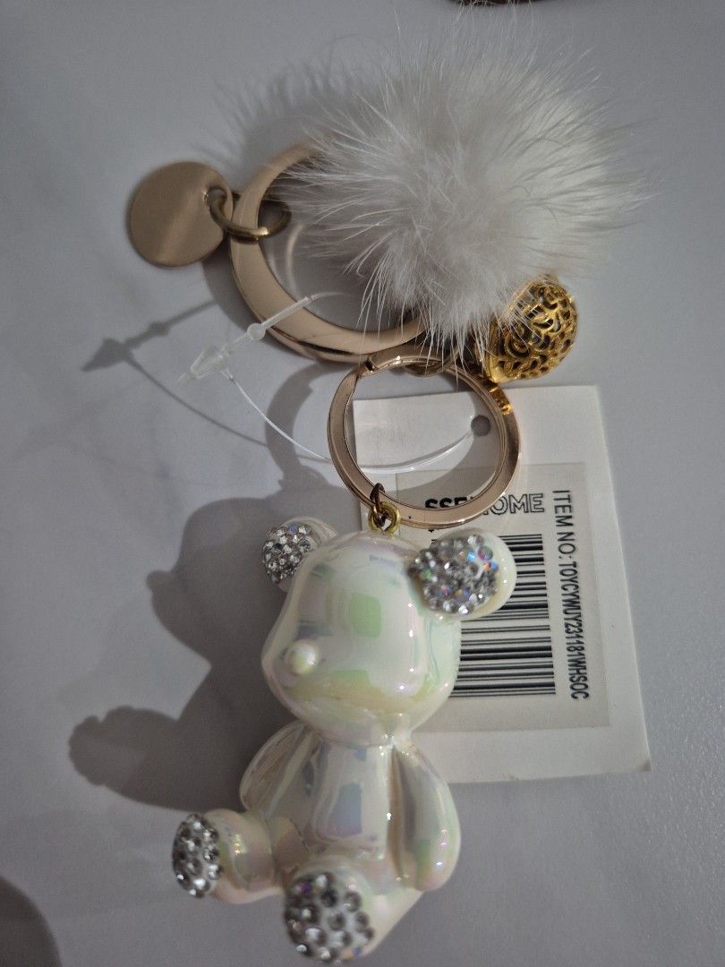 Keychain (Category: Character Goods) located in Singapore. Submitted by scrunchie (Listing ID 1454512936, Image 1). Description: Cute keychains for sale. 1. Bear keychain 2. Music keychain Perfect as gifts! .