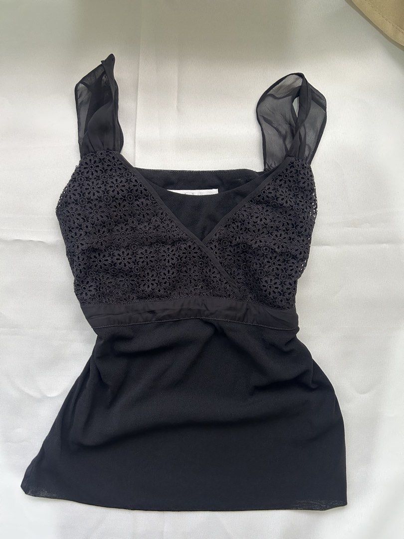 Lace sleeveless mesh top (Category: Sleeveless) located in Dumaguete. Submitted by hellograbs (Listing ID 1454415221, Image 1). Description: Fits XS-M Perfect going out top. Not see through at all. Fabris is stretchy and breathable. SF: J&T.