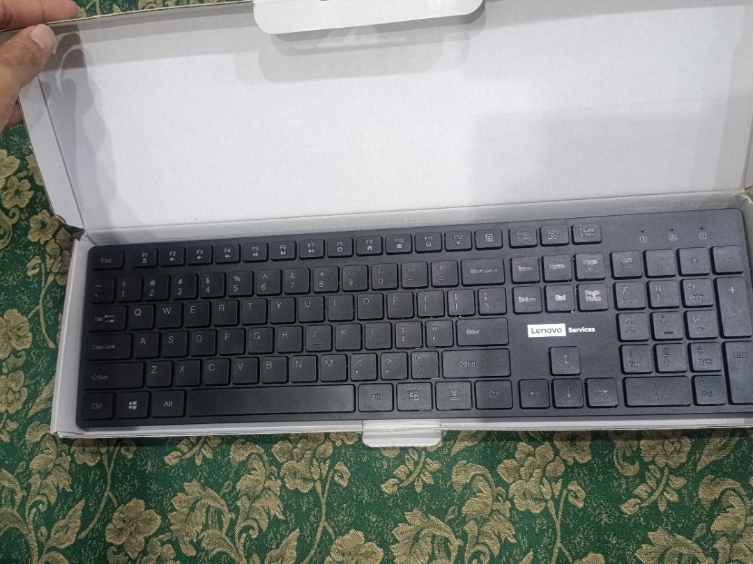 Lenovo Wireless Keyboard (Category: Computer Keyboard) located in Batac City. Submitted by yellowstone_1012 (Listing ID 1454367498, Image 3). Description: - Lenovo Wireless Keyboard - Color: Black - Full-sized layout with dedicated number pad - Powered by AAA batteries (free batt) - Comes in original packaging - Ideal for enhancing your desk setup.