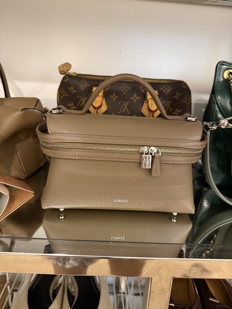 Lomafe Mini Leri (Category: Cross-body Bags) located in San Juan City. Submitted by dyclutter (Listing ID 1454398311, Image 1). Description: Srp: Php 12,500 Color: Taupe Condition: 9/10 Inclusions: Bag and long strap only RFS: decluttering Can provide receipt that it was purchased at full price and not during their sale Last price already posted Shipping fee must be shouldered by the buyer.