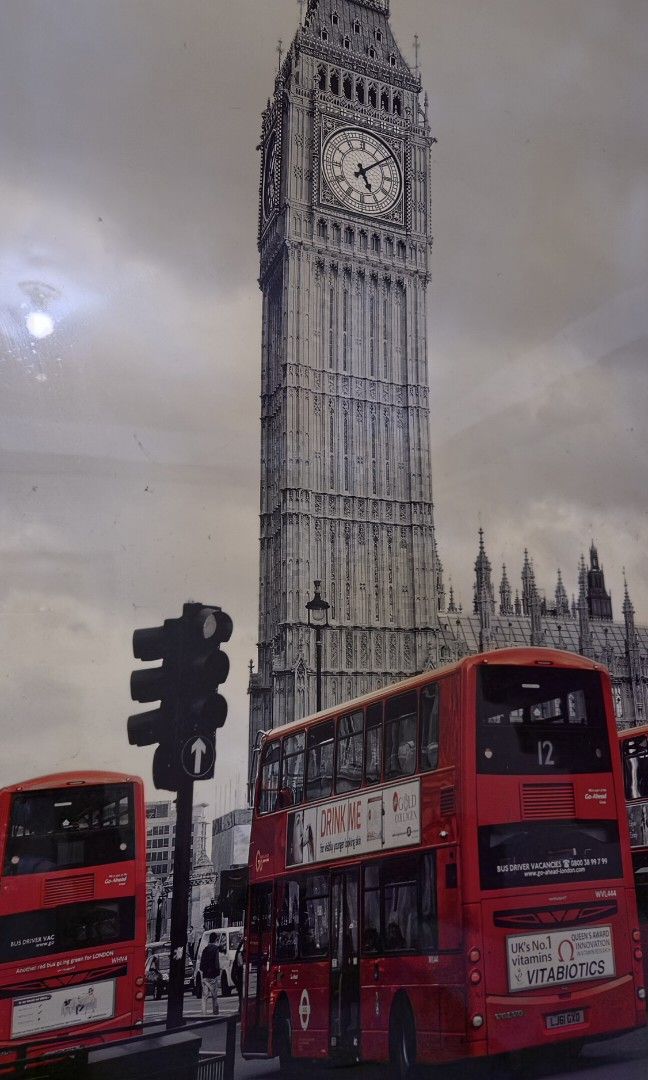 London Big Ben Red Bus Framed Wall Art (Category: Wall Decor) located in Manila. Submitted by bravewaters (Listing ID 1454533786, Image 3). Description: - Original price: ₽3499.75 - Dimensions: 40 x 24.5 inches / 101.6 x 62.23 cm - Iconic London scene featuring Big Ben and red double-decker buses. - Classic black and white print with striking red accents. - Perfect for adding a city vibe to your space. - Comes ready to hang..