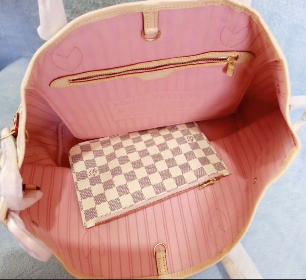 LV Damier Azur Neverfull MM Tote Bag (Category: Luxury Bags & Wallets) located in Pasig City. Submitted by zen_it_all (Listing ID 1454559874, Image 2). Description: - LV tote bag (for self authentication) - Classic Damier Azur canvas - Chic pink interior - Comes with a matching pouch - Spacious and ideal for everyday use or travel -with dust bag -plus SF (no rush shipping).