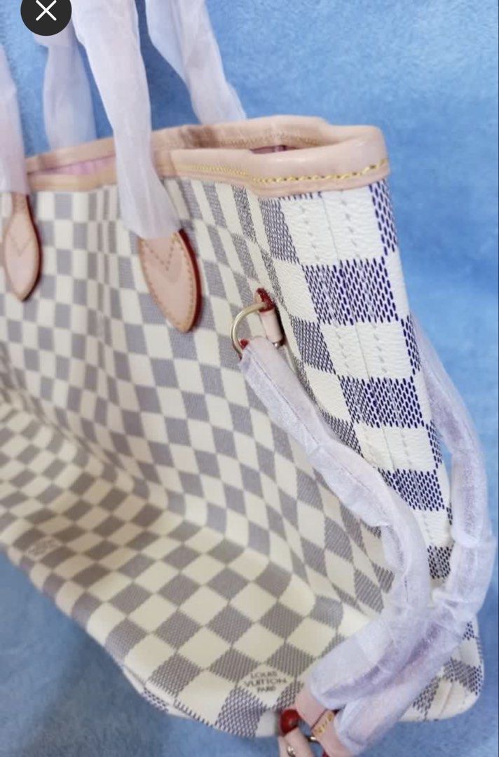 LV Damier Azur Neverfull MM Tote Bag (Category: Luxury Bags & Wallets) located in Pasig City. Submitted by zen_it_all (Listing ID 1454559874, Image 1). Description: - LV tote bag (for self authentication) - Classic Damier Azur canvas - Chic pink interior - Comes with a matching pouch - Spacious and ideal for everyday use or travel -with dust bag -plus SF (no rush shipping).