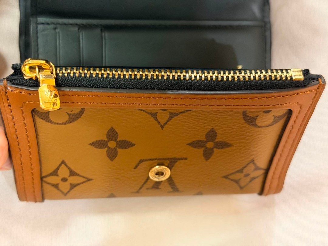 Louis Vuitton Dauphine Compact Wallet (Category: Luxury Bags & Wallets) located in San Pedro. Submitted by closetbyiya_ (Listing ID 1454505834, Image 2). Description: - Authentic Louis Vuitton wallet - Priced for 60k, selling for 30k - RFS: Upgrade - Can do meetups around Alabang, BGC areas.