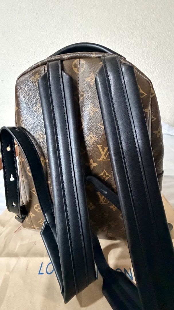Louis Vuitton Monogram Canvas Palm Springs Mini Backpack (Category: Luxury Bags & Wallets) located in Caloocan City. Submitted by prof_music1979 (Listing ID 1454387331, Image 3). Description: Model: Palm Springs Reference: M44873 Canvas: Classic LV Monogram-coated canvas Trim: Black leather Hardware: Gold-tone Straps: Black leather Top handle: Black Front pocket: Yes Black LV Paris leather tab: Yes.